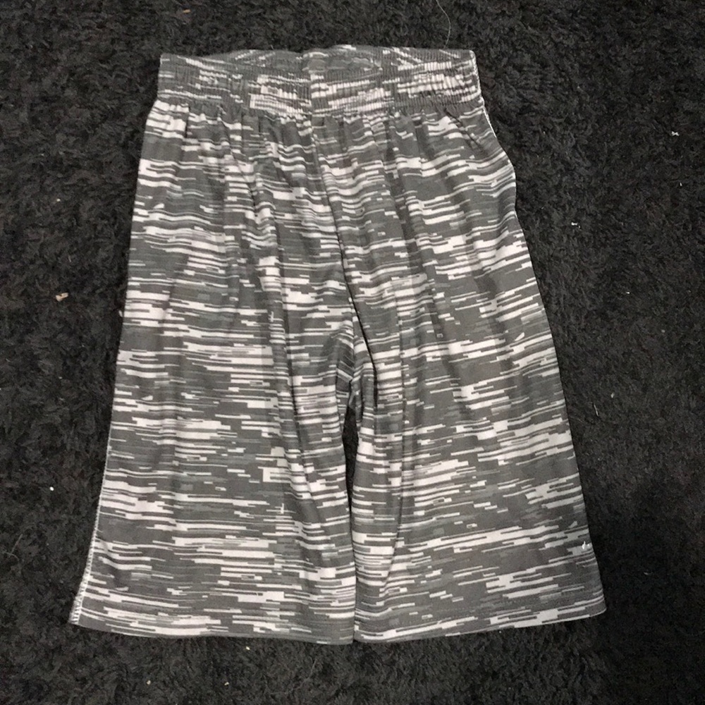 Greg and black shorts